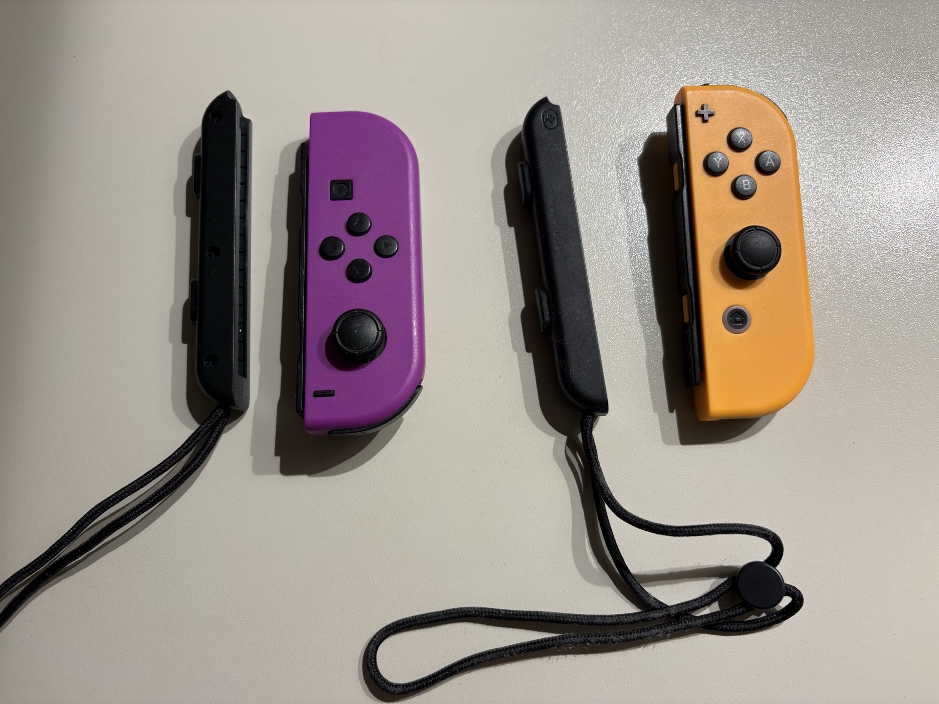 Switch 手柄 Joy-Con 副厂一对（紫+橙，含腕带） (1)