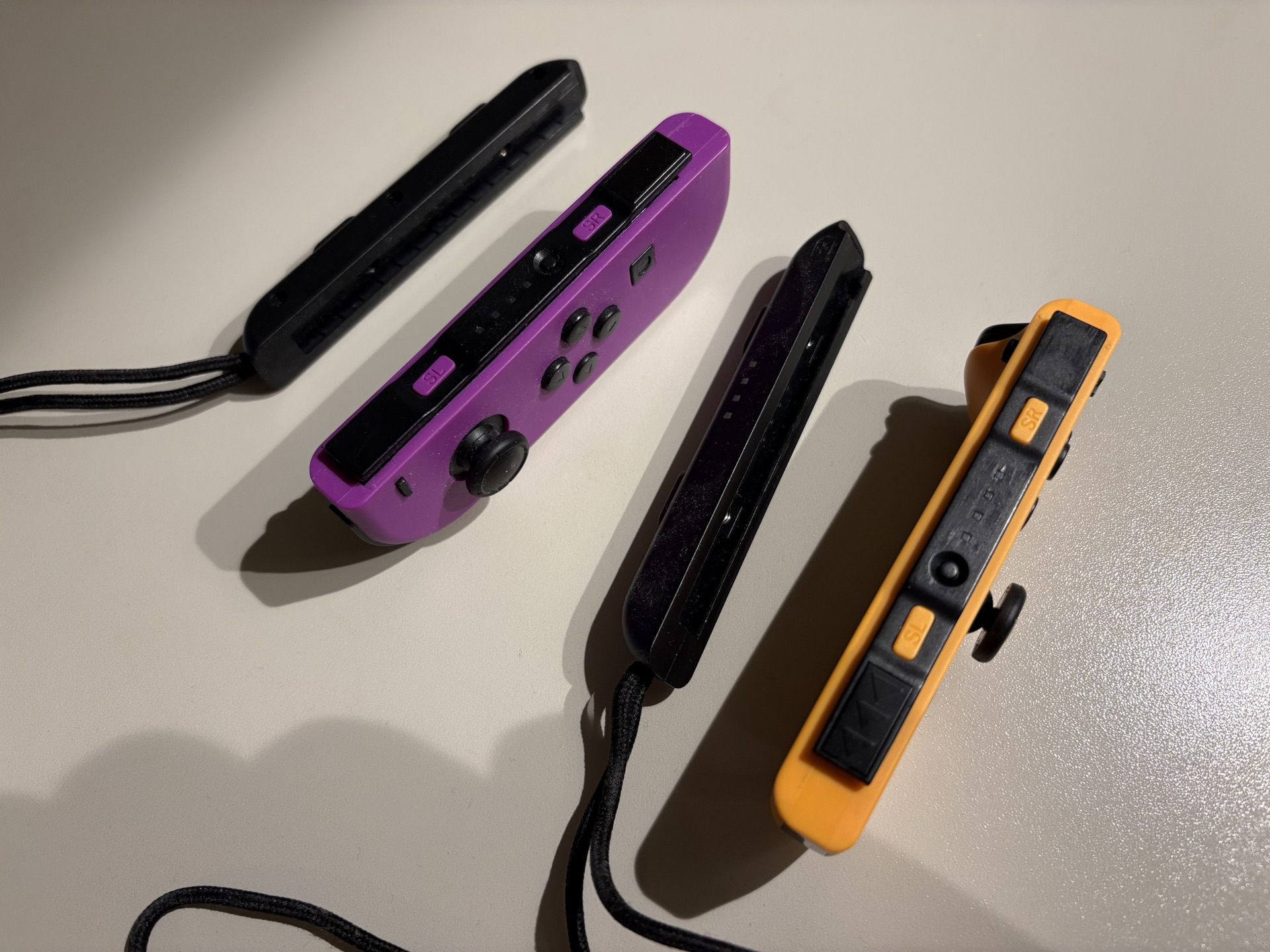 Switch 手柄 Joy-Con 副厂一对（紫+橙，含腕带） (2)